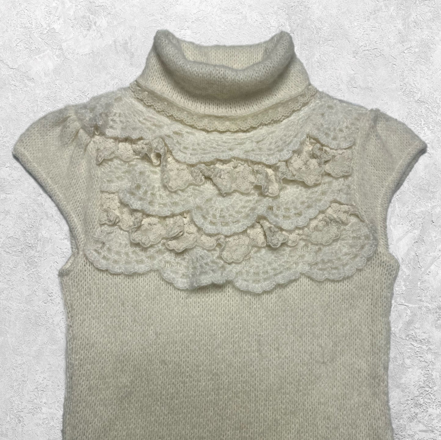 Elegance is an Attitude Knit Short Sleeve Turtleneck Top