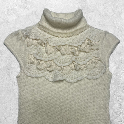 Elegance is an Attitude Knit Short Sleeve Turtleneck Top